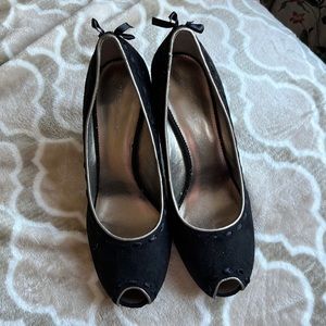 Faux suede black peep toe pumps